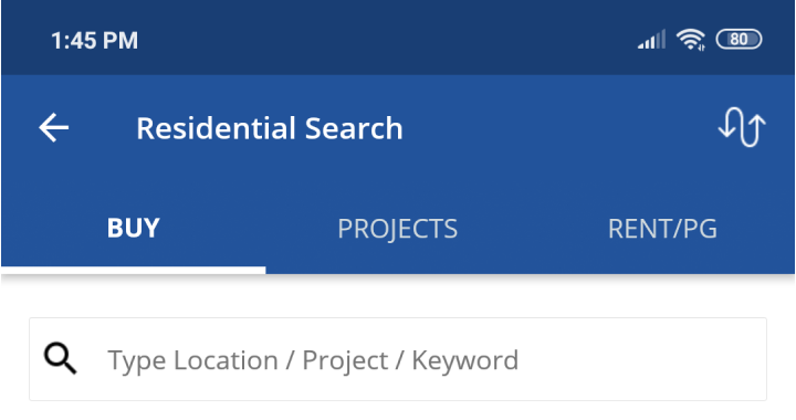 The old form: a dense blue header with BUY, PROJECTS and RENT/PG tabs and a single location field.